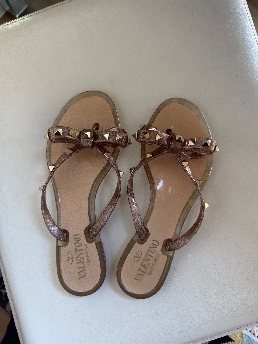 Valentino Garavani Metallic Bronze Studded Bow Thong Sandals